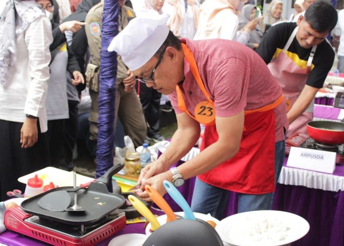 HUT ke-52 Korpri dan HUT ke-24 DWP Meriah, Kepala Dinas di Pemkab Pekalongan Ikuti Lomba Masak Nasi Goreng 