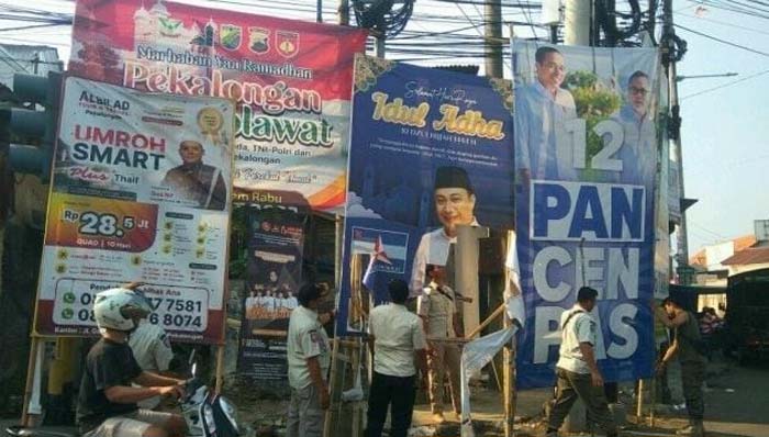 Melanggar Perda, Satpol PP Tertibkan Reklame Caleg dan Parpol