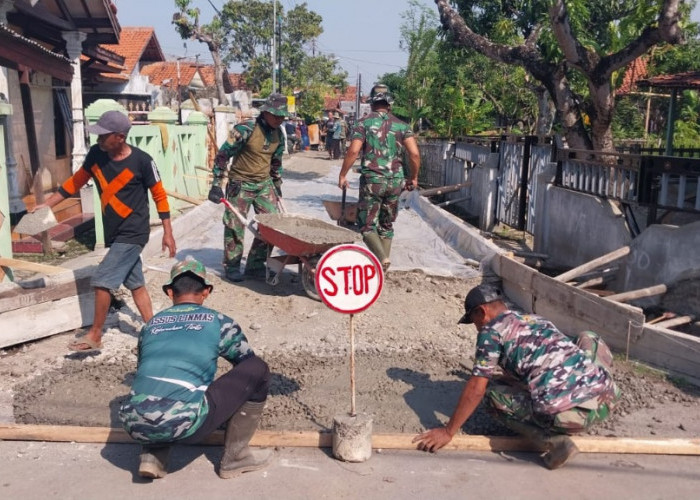 Solid, TNI bersama Warga Bangun Jalan Beton dan Talud Atasi Banjir dan Rob di Pekalongan