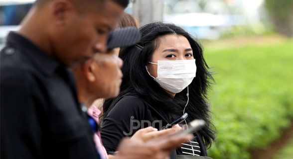 Cegah Virus Corona, Masyarakat Dianjurkan Gunakan Masker Kain Tiga Lapis